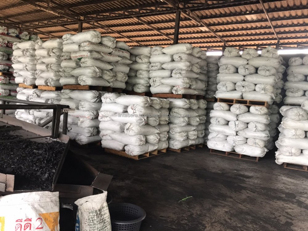 Natural lump hardwood charcoal and charcoal briquettes in packaging