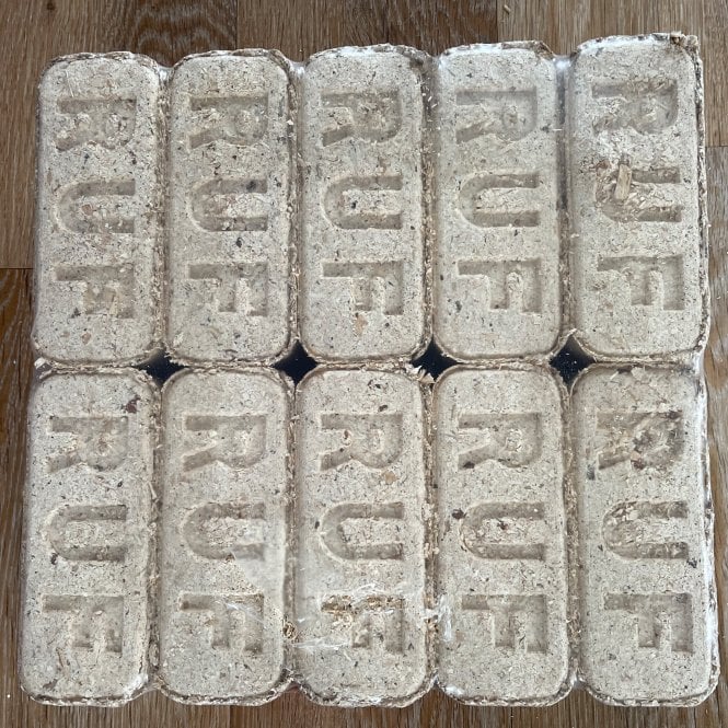 Packaged bundle of wood briquettes ready for retail sale